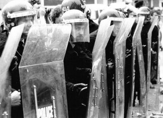 Riot police with shields during the miners' strike