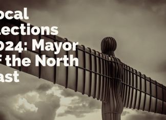 Who Will Be the Next Mayor of the North East? : Local Mayoral Election 2024 Angel of the North sculpture under a clear sky with text 'Local Elections 2024: Mayor of the North East', photo by Alan Dobson on Pixabay.