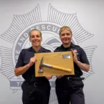Natalie Mortimer holding the Silver Axe award (credit TWFRS)
