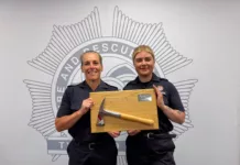 Tyne and Wear Firefighters Inspire Next Generation Through Silver Axe Success Natalie Mortimer holding the Silver Axe award (credit TWFRS)